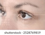 eye laser surgery concept, close up of female amber eye with digital augmentation