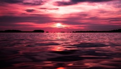 Eye Level Horizon View Of Sunset Dusk At Sea