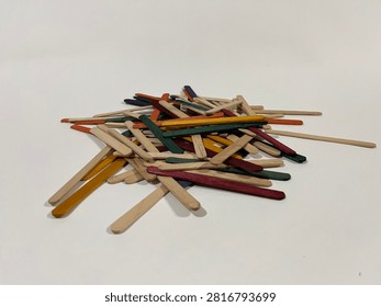Eye Level View of Multi Colored Wooden Popsicle Sticks Heap