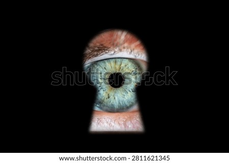 Eye looking through a keyhole, signifying curiosity, surveillance, and restricted viewing