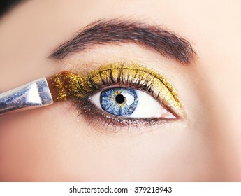 Eye Makeup. Beautiful Eyes Glitter Make-up. Holiday Makeup Detail.

