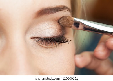 Eye makeup woman applying eyeshadow powder - Shutterstock ID 120600151
