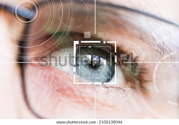 Eye monitoring and eye scan. Biometric scan of male\
eyes close up.
