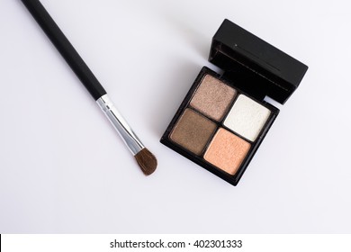 Eye Shadow With Brush On White Background.