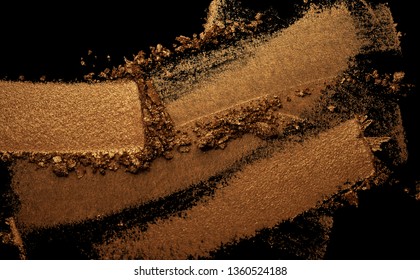 Eye shadow metallic brown terracota gold texture background black isolated 