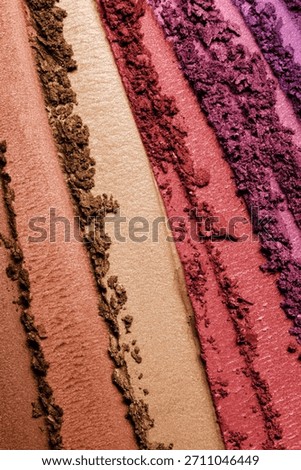 Eye shadow texture background. Blush, bronzer swatch. Shimmer makeup powder palette close up
