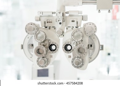 Eye sight vision test machine with white tone blurry lab background - Powered by Shutterstock