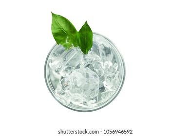 Bird’s eye view of a cup of ice decoration with green leaves on white background