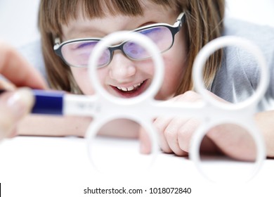 Eye Vision Therapy. Child With Prism Flippers. 