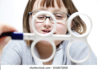 Eye Vision Therapy. Child With Prism Flippers. 