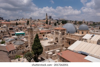 Eye-bird panoramic view on Jerusalem Old City. Two gray domes of Church of the Holy Sepulchre on the foreground. Church of the Holy Sepulchre under reconstruction. - Shutterstock ID 2017262051