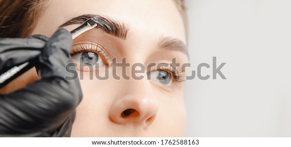 Eyebrow tint,\
master correction of brow hair\
women.