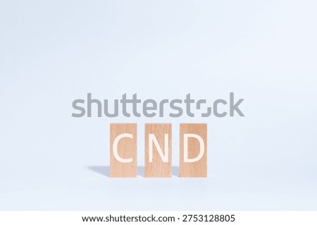 Eye-catching image of CDN text on wood blocks. The word stands for Content Delivery Network.