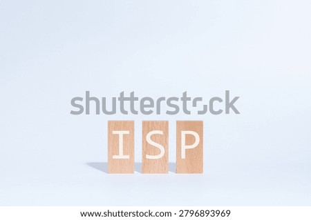 Eye-catching image of ISP text on wood blocks. The word stands for Internet Service Provider.