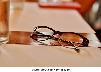 Eyeglasses in the table