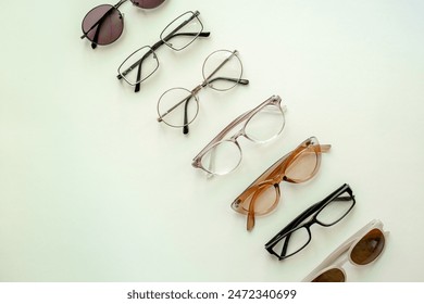 Eyeglasses top view. Comparing lenses in optics store. - Powered by Shutterstock