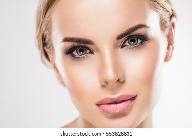 Eyes Beauty Woman face Portrait close up. Beautiful model Girl with Perfect Fresh Clean Skin Lips