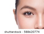 Eyes. Closeup of beautiful asian woman with brown eyes make up eye shadow