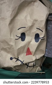 Eyes  nose  mouth    face drawn paper bag 