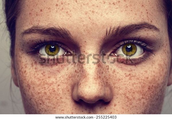 Eyes nose woman\
portrait with freckles