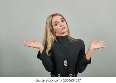 Eyes Open Wide, Surprised Look, Delightfully Plants Hands, Showing Palms Spreading Fingers, Emotional, Shocked With News. Arms Hug, So Happy To See You. Young Attractive Woman, Dressed Black Sweater