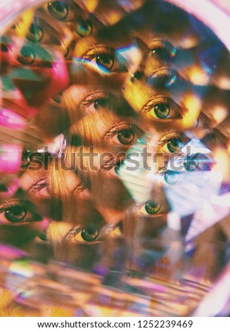 Eyes seen through a kaleidoscope lens