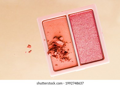 Eyeshadow powder or blush makeup palette as flat lay isolated on golden background, beauty eye shadow as flatlay design, crushed make-up and cosmetic product.