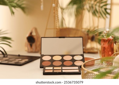Eyeshadows on table in dressing room, closeup