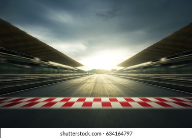 F1 evening circuit motion blur road - Shutterstock ID 634164797