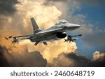 F-16 Fighting Falcon fighter jet (model) against dramatic clouds