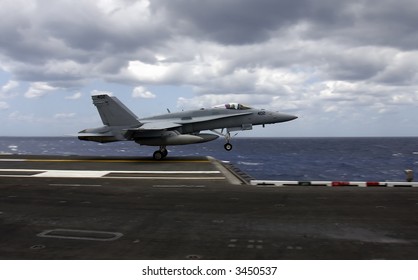 An F-18 Hornet Takes Flight After A Catapult Launch From An Aircraft Carrier