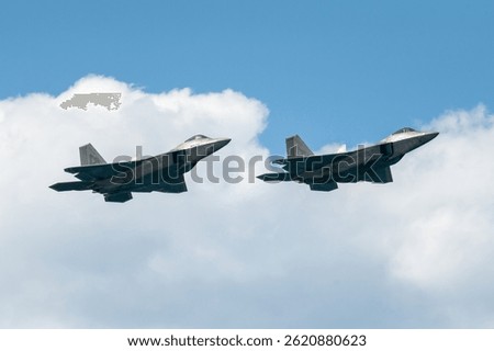 F-22 flying through the sky