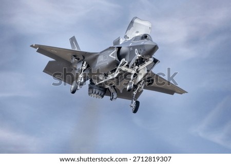 f35 Lightning two in hover position