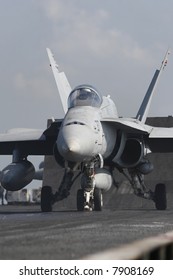 An F/A-18C Hornet Awaits Catapult Assisted Takeoff On The Nuclear Aircraft Carrier, USS Enterprise