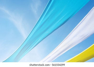 Fabric Of Blue, White, Yellow Across The Sky