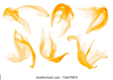 Fabric Cloth Flowing On Wind, Flying Blowing Yellow Silk, Isolated Over White Background