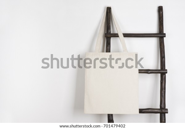 Download Fabric Cloth Shopping Bag Mockup Hanging Stock Photo Edit Now 701479402 PSD Mockup Templates