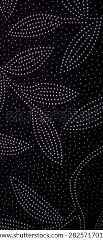 fabric with embossed leaf patterns. very interesting.