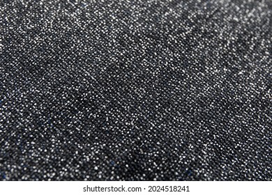 Fabric evening gray dress girl with sequins, rhinestones. colorful sequined texture