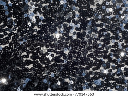 Fabric texture, background, black sequined.tinsel, trumpery, frippery, gaud, gewgaw, gimcrack