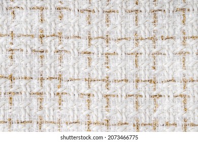 Fabric texture background with golden yarn
