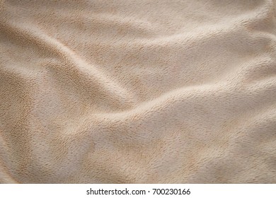 Fabric Texture, Close Up Of Light Brown Cozy Blanket Fabric Texture Pattern.