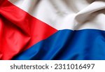 Fabric texture flag of Czech Republic. Flag of Czech Republic waving in the wind. Czech Republic flag is depicted on a sports cloth fabric with many folds. Sport team banner.