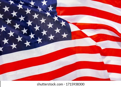 Fabric Texture Flag Of USA. Flag Of United States Of America Waving In The Wind. US Flag Is Depicted On A Sports Cloth Fabric With Many Folds. Sport Team Banner.