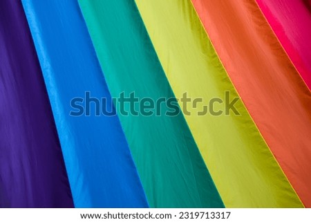 Fabric texture rainbow flag symbol of love or LGBT pride concept. pride month celebrates the festival background