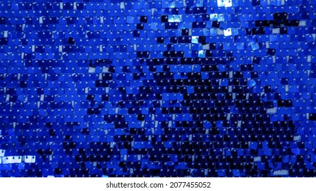Fabric texture with spangles. Background sequin. Glitter texture. Fabric sequins.. Blue sequins pattern. Abstract background.
