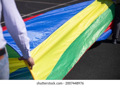 A Fabric Tunnel For Entertainment. Sports Rest And Sports Equipment. An Obstacle To Missing. Rainbow Tunnel.