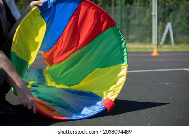 A Fabric Tunnel For Entertainment. Sports Rest And Sports Equipment. An Obstacle To Missing. Rainbow Tunnel.