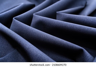 Fabric With Wrinkles And Folds. Textile With Waves. Material Texture