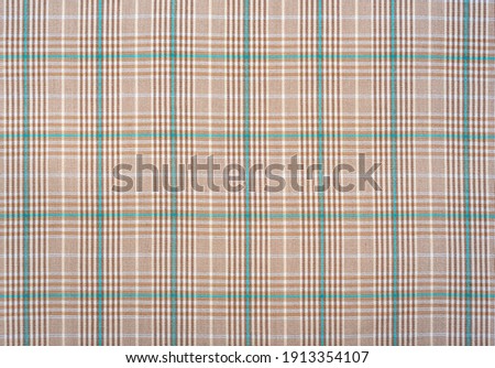Fabric.Checkered fabric. Checkered pattern on fabric of different colors. Material for clothing